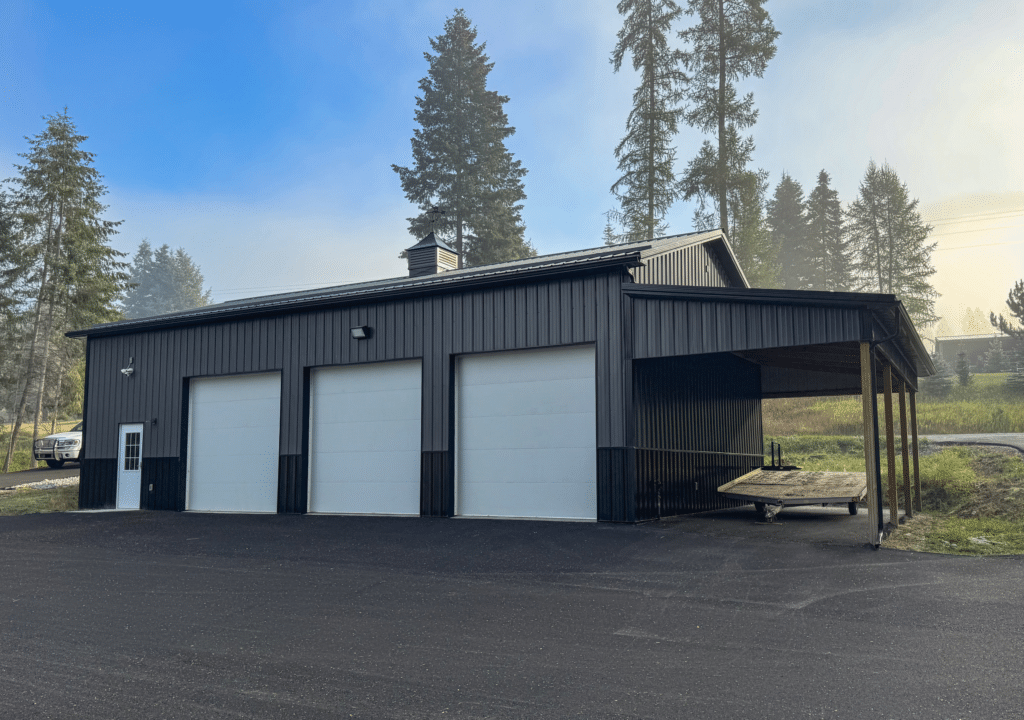 A 30x48x14 Three door Garage built by MQS, featuring Gray Metal Siding, and Black Metal Trim and Roofing, available for custom order in MT, ID, WA, & WY A 30x48x14 three-door Garage built by MQS, featuring Gray Metal Siding, and Black Metal Trim and Roofing, available for custom order in MT, ID, WA, & WY