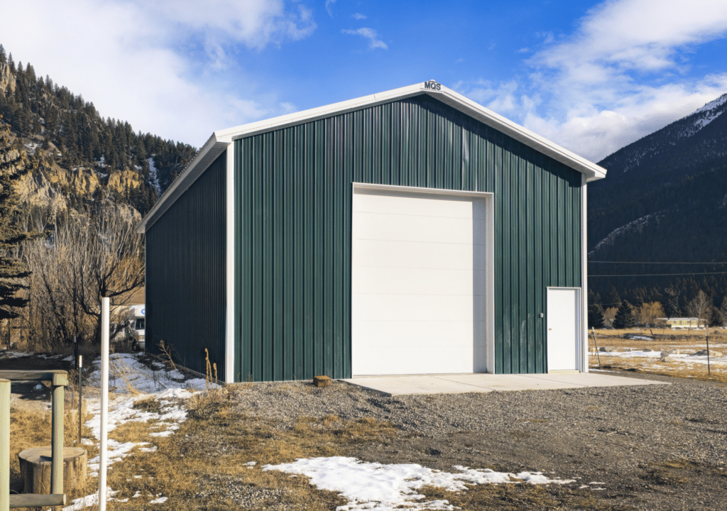 A 30x48x16 Commercial Vehicle_RV Storage, Built By MQS, Featuring Green Metal Siding, And White Trim and Roofing, In Bozeman, MT A 30x48x16 Commercial Vehicle_RV Storage, Built By MQS, Featuring Green Metal Siding, And White Trim and Roofing, In Bozeman, MT