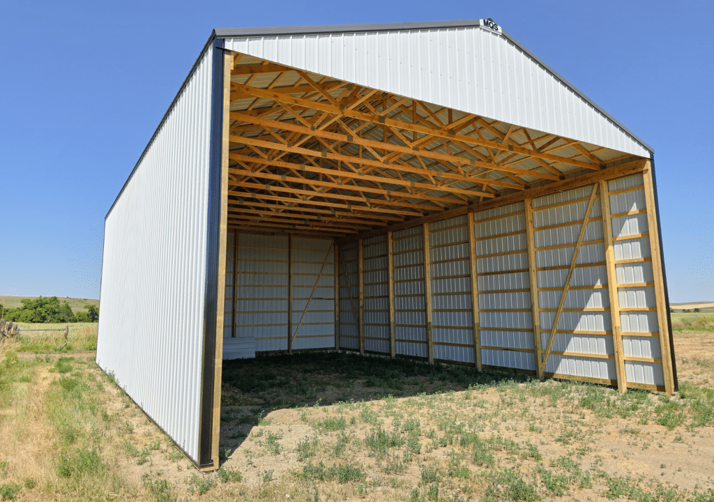 A 36x52x18 Hay Storage, built by MQS, Featuring White Metal Siding, and Dark Grey Metal Roof, in Garryowen, Montana A 36x52x18 Hay Storage, built by MQS, Featuring White Metal Siding, and Dark Grey Metal Roof, in Garryowen, Montana