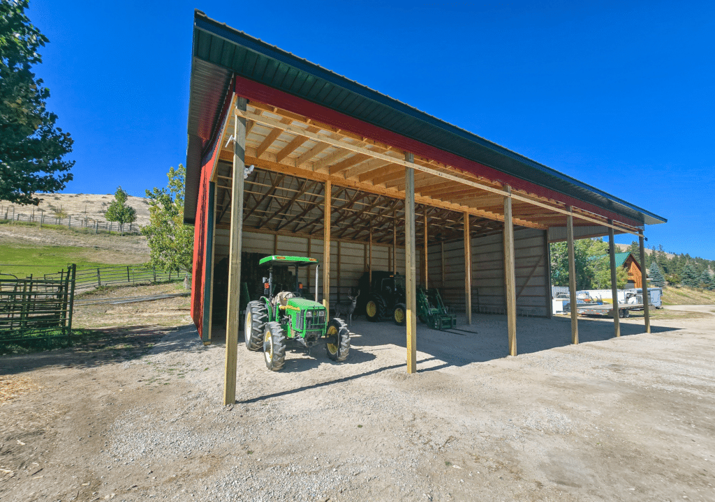 A 36x60x18 Hay_AG Equipment Storage, Built by MQS, with red metal siding and forest green metal trim and roofing, in Darby, MT A 36x60x18 Hay_AG Equipment Storage, Built by MQS, with red metal siding and forest green metal trim and roofing, in Darby, MT