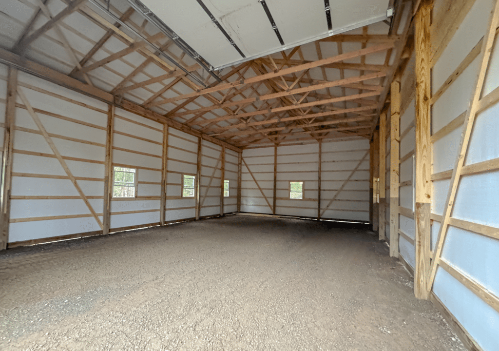 Interior 30x48x16 Hobby_Workshop_Home Garage, built by MQS, featuring dark grey metal siding, with black metal trim, in Thompson Falls, MT Interior 30x48x16 Hobby Workshop Home Garage, built by MQS, featuring dark grey metal siding, with black metal trim, in Thompson Falls, MT