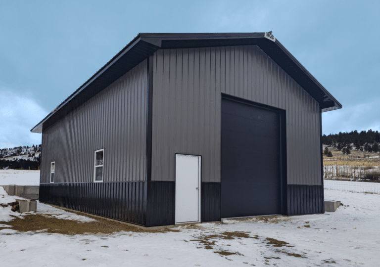 30x48x16 built by MQS RV Storage residential pole barn, with Gray metal siding, Black metal Trim, black metal roofing, In Jefferson City, Montana