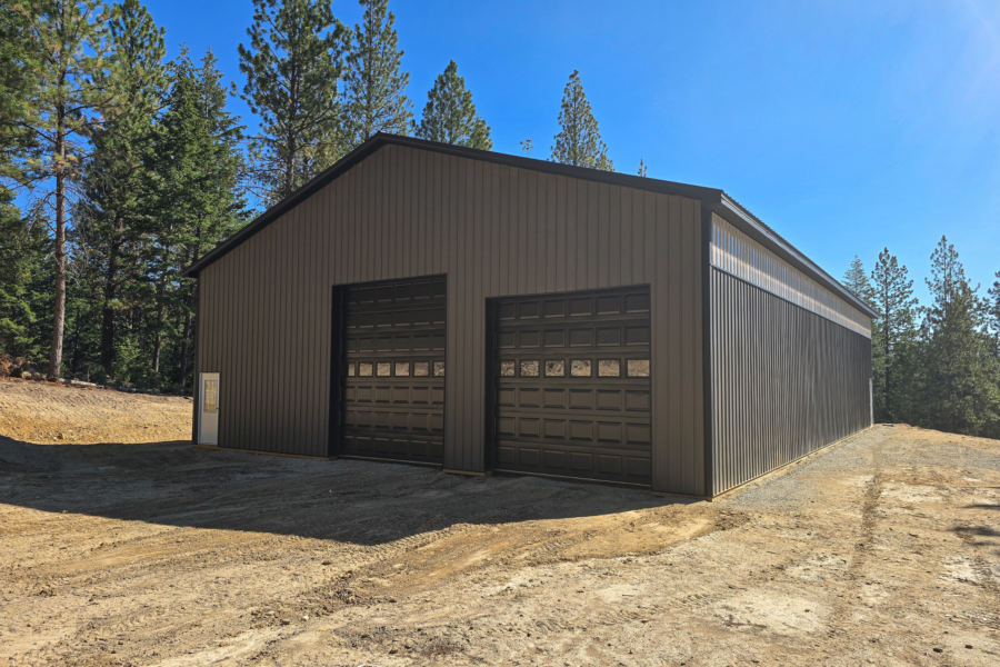 50x80x16 Vehicle RV Storage pole barn built by MQS, Featuring Charcoal Metal Siding, Black Metal Trim and Roofing, available for custom build in Montana