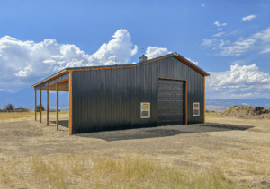 30x48x16 Vehicle_RV Multi-purpose storage residential pole barn, featuring Dark Grey metal Siding, and Copper Penny Metal Trim, built by MQS, in Florence, MT