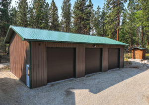 30x56x14 3 Door Equipment Shop Vehicle Storage pole barn, featuring Brown Metal Siding with Green Metal Roofing available for custom order build from MQS in Bingham County ID