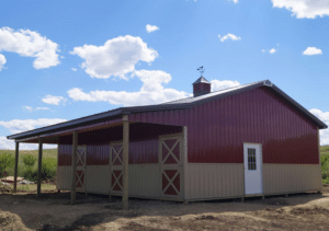 36x48x10 3 stall horse barn pole building with red metal siding and tan metal roofing, trim, and wainscoting, available for custom build by MQS in MT, ID, WA, WY