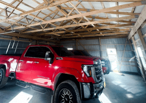 A 30x40x10 Hobby workshop Home Garage Interior, Built by MQS, Featuring Copper Metal Siding, White Metal trim, and Evergreen Metal Roofing, in Worden, MT