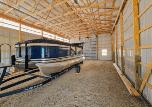 A 30x48x16 Vehicle_RV Multi-purpose storage residential pole barn Interior, featuring Dark Grey metal Siding, Copper Penny Metal Trim, and black metal roofing, Built by MQS, in Florence, MT