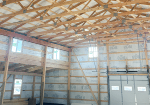 A 36x60x16 Hobby Workshop Home Garage Interior, Built By MQS, Featuring White Metal Siding, and Black Metal Roofing, in Billings, MT
