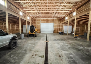 A 40x100x20 Multi-Stall Monitor Style Horse_Equine Equestrian Pole Barn Interior, Built By MQS, featuring Distressed Gray Barnwood Metal Siding, and Burnished slate Roofing, in Elliston, MT