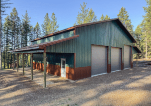 A 50x40x16 Fully Insulated Garage_Hobby Shop, Featuring Evergreen Metal Siting, and Aged Copper Metal roofing and wainscoting, Built By MQS, in Huson, MT