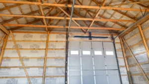 A 30x48x16 Hobby_Workshop_ Home Garage Interior, Built By MQS, in Helena, MT, Featuring Charcoal Metal Siding, and Taupe Metal Roofing