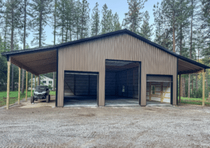 A 40x60x16 3-Door Hobby Shop, Workshop, Home Garage, Built By MQS, featuring Desert Brown Metal siding, and Black metal roofing and trim, in Huson, MT