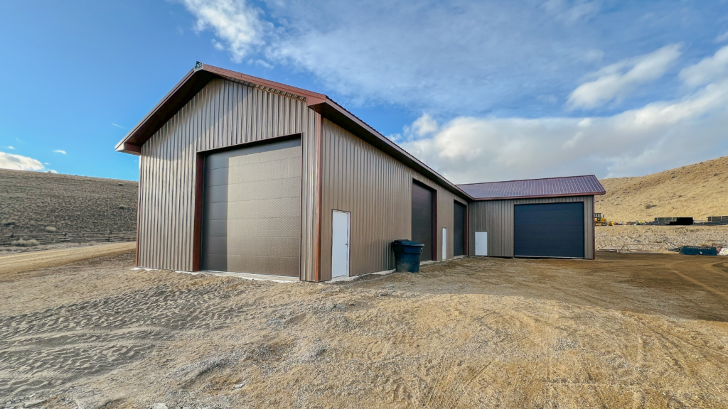 30x70x16 by 30x60x16 Large commercial maintenance facility pole barn, with Buckskin Metal Siding, And Copper Metal Roofing, available for custom build along with all needed engineering by MQS in MT