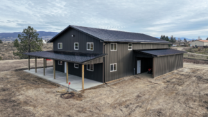40x64x16 Bardominium Shell and Home Garage, with Lean-to, Featuring Gray Metal Siding, And Black Metal Roofing, Built By MQS, in Stevensville, MT