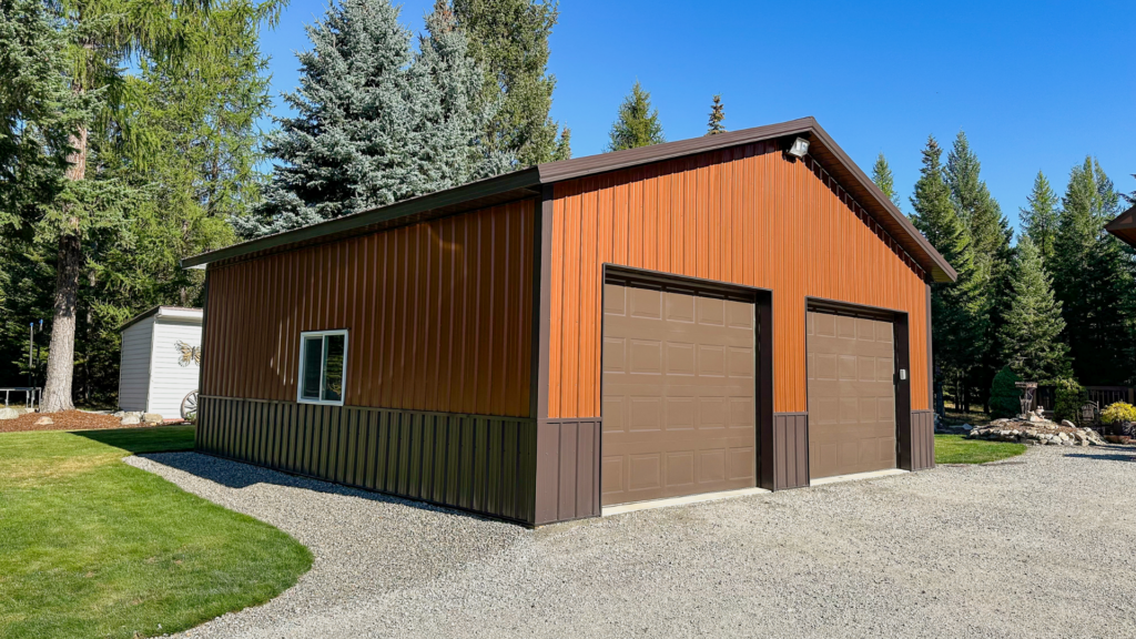 A 28x28x10 Garage Hobby Shop, Featuring Aged Copper Metal Siding, Brown Metal Trim and Wainscoting, and Brown Metal Roofing, available for custom build by MQS with all needed permit documents in MT