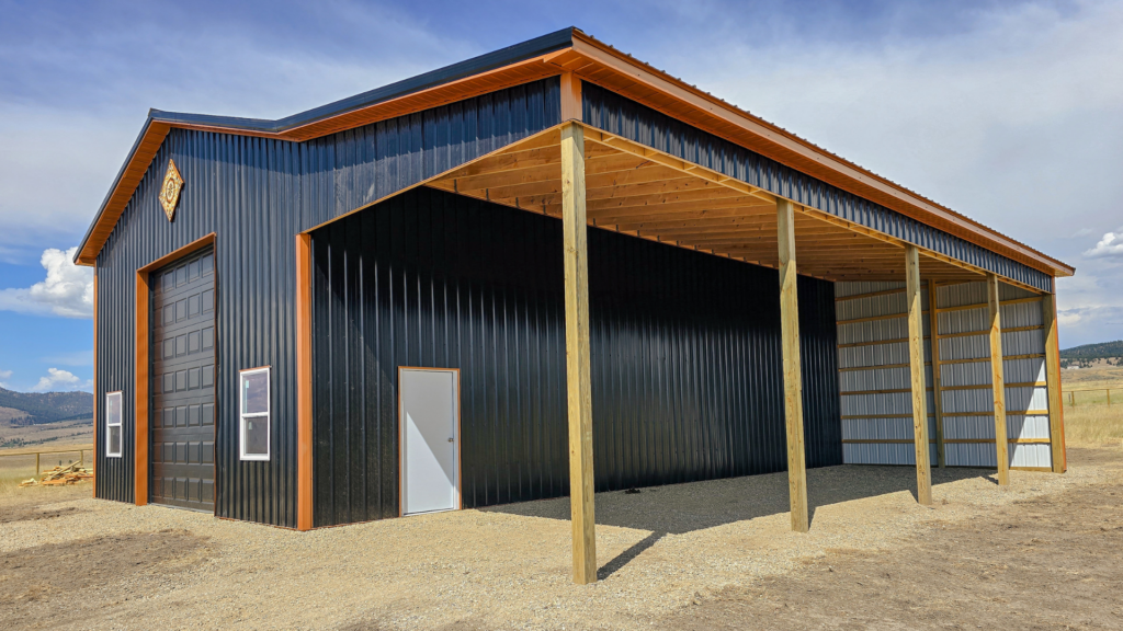 A 30x48x16 Heavy Weather Ready, Vehicle_RV Multi-purpose storage residential pole barn, with Dark Grey metal Siding, Copper Penny Metal Trim, and black metal roofing, available for custom build by MQS in MT
