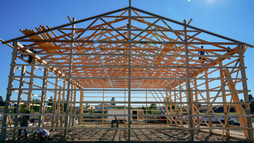 An in process 40x64x16 Bardominium_Garage, Featuring Gray Metal Siding, Brown Metal Trim, and Black Metal Roofing, Built By MQS in Stevensville, MT