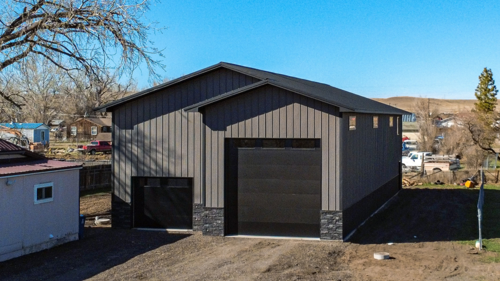 How to financially compare a home against a 36x76x18 Barndominum Shell Shome, featuring Krinkle Charcoal Metal siding, and Krinkle Black Metal Roofing wainscoting and trim, built by MQS, in MT