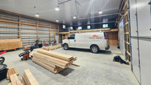 Inside a 40x64x16 Bardominium shell and Garage Interior, Featuring Gray Metal Siding, And Black Metal Roofing, Built By MQS in Stevensville, MT