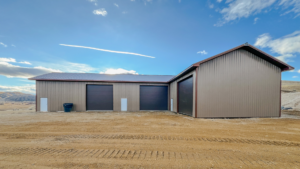 30x70x16 with 30x60x16 Addition, Large commercial Golf maintenance facility buildings, Built By MQS, Featuring Buckskin Metal Siding, in Twin Bridges, MT
